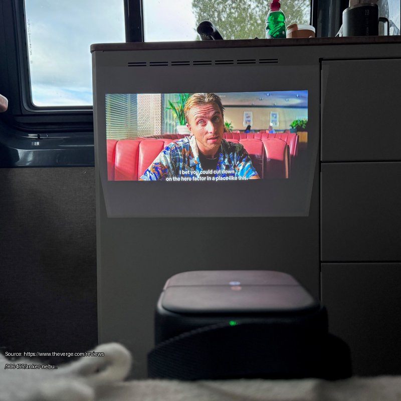 <em>Projected onto the side of my van’s “kitchen.” It still looks pretty good with the image compressed into a 24-inch diagonal at mid-day.</em> - Fair use review image from https://www.theverge.com/reviews/906455/anker-nebula-p1-review-vanlife-sound-champ